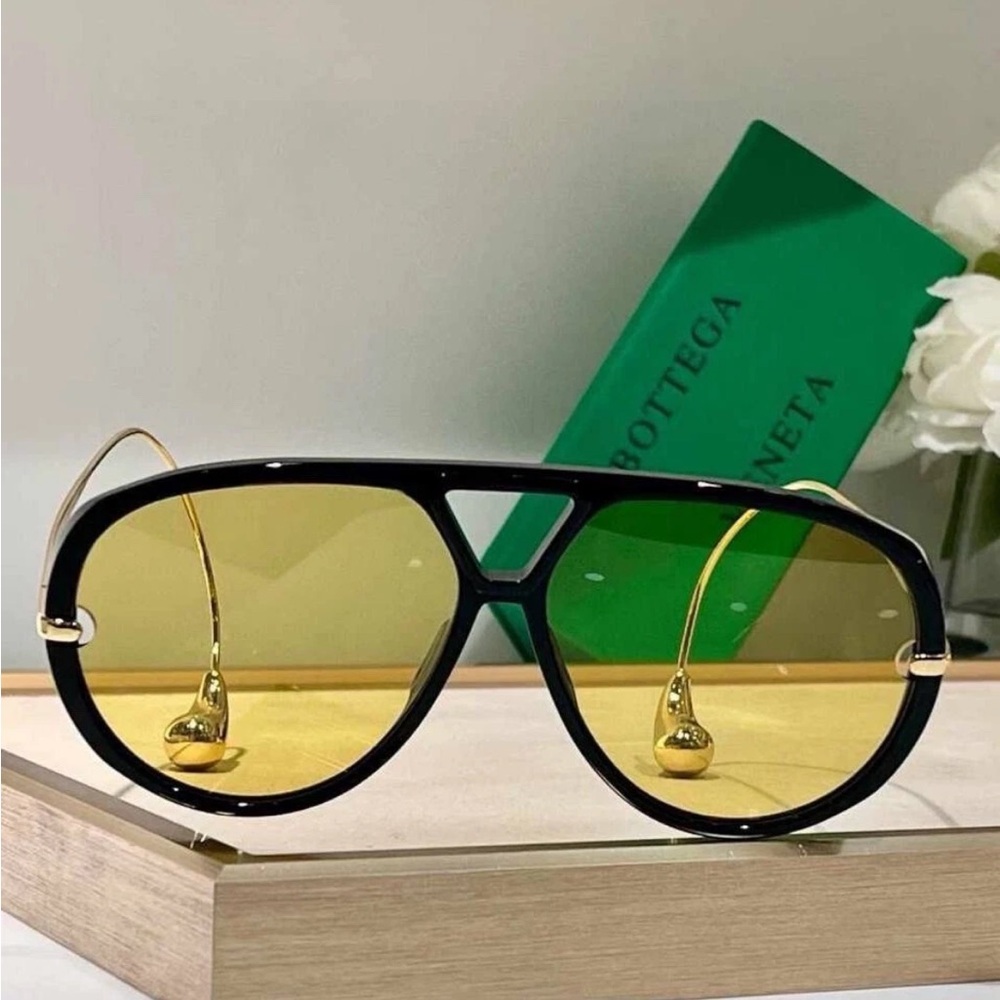 Bottega Veneta Black Frame Sunglasses with Gold Accents